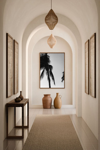 Tirage photo fine art noir et blanc de palmiers en silhouette sur ciel dégradé