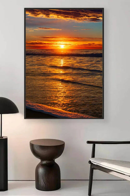 Tirage photo fine art coucher de soleil sur l’océan avec reflets dorés et ciel nuageux